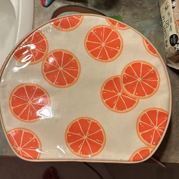 Kate Spade 11” clutch NWT. The only flaw is a small water mark under plastic. - Picture 2 of 16